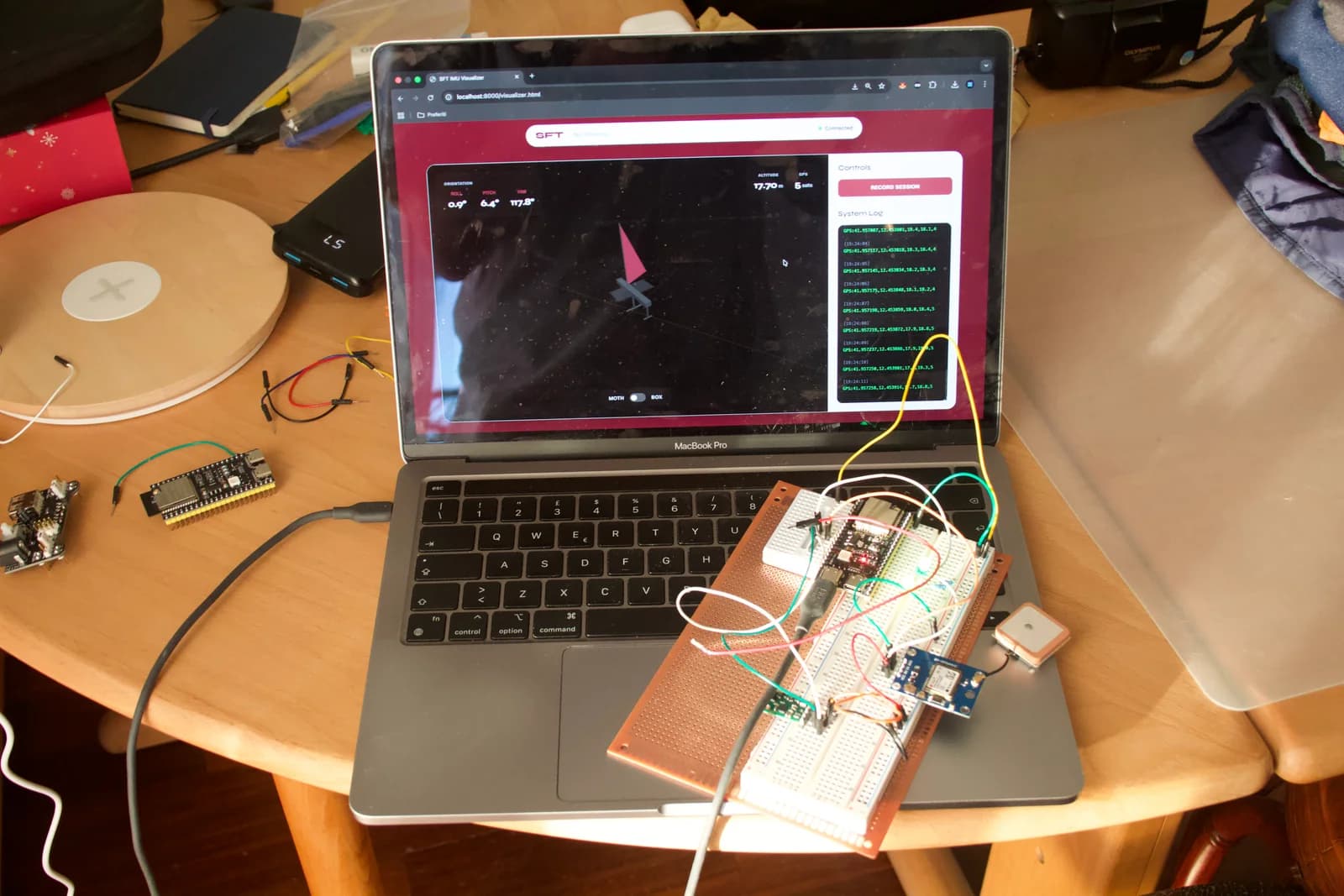 The wired prototype alongside the connected 3D visualiser.